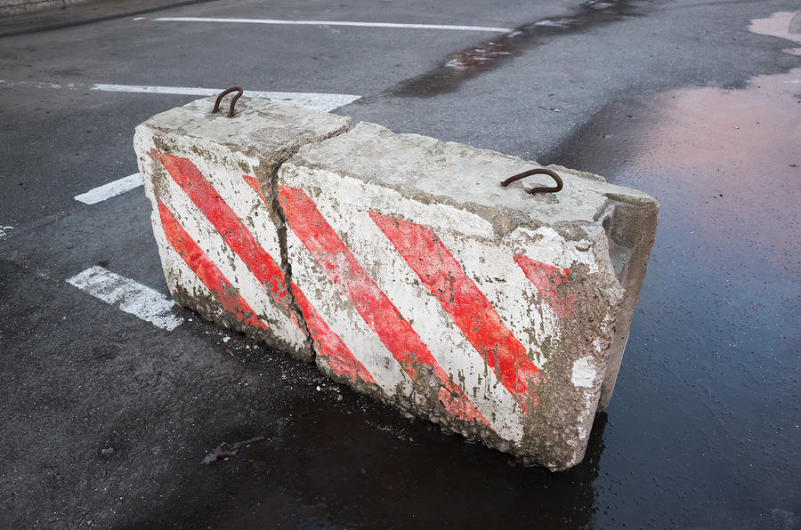 bigstock-Broken-Concrete-Road-Block-Wit-123402200.jpg